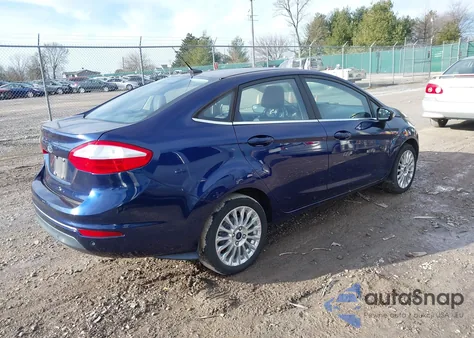 2016 Ford Fiesta Titanium z USA, uszkodzony, nr VIN 3FADP4CJ2GM149273